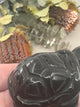 vide of Black Obsidian Turtle Carving 5 cm × 3.5 cm – glossy black crystal turtle symbolising protection, grounding and clarity, Inspired By 3 Australia.