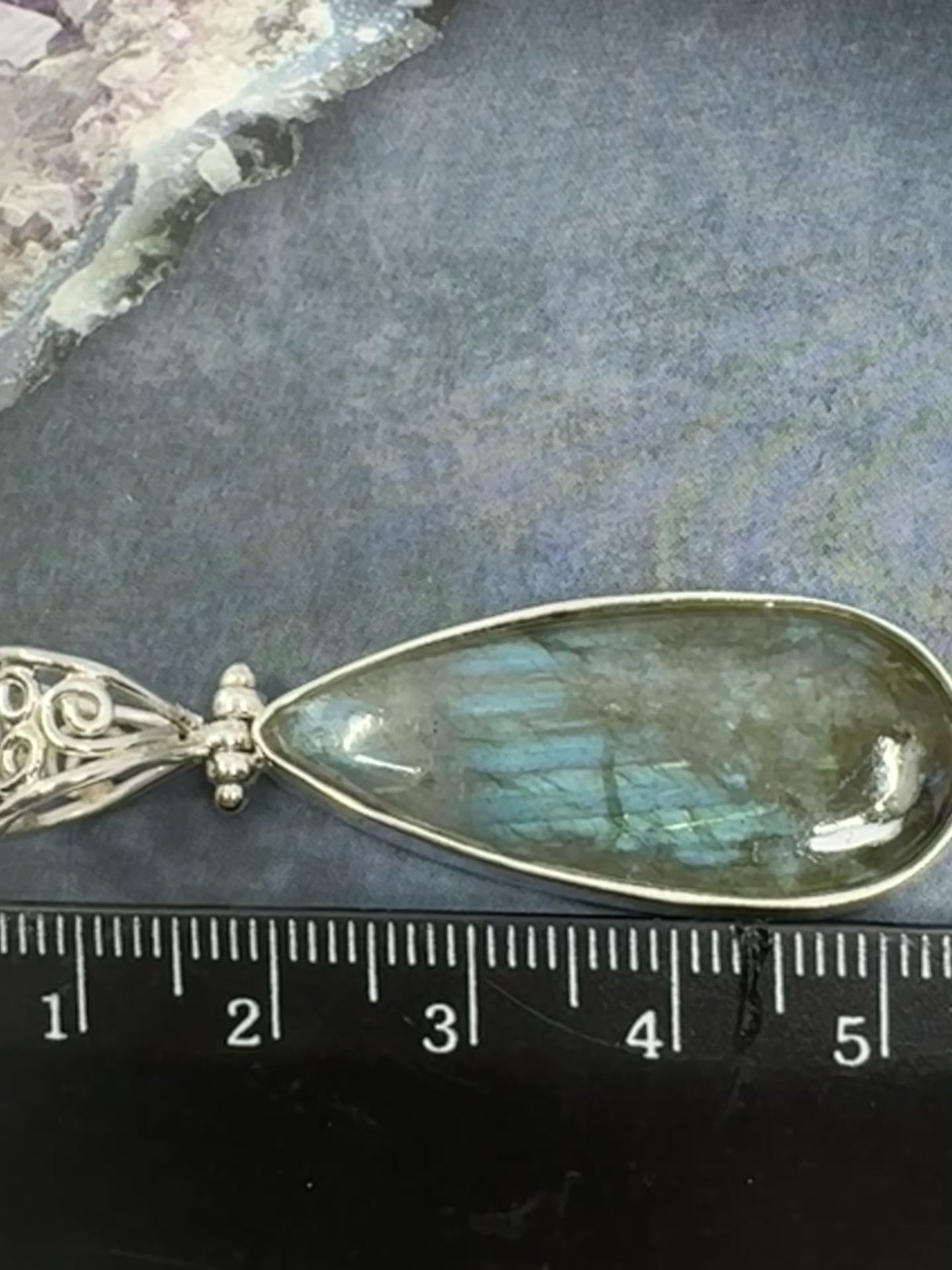 Labradorite Silver Pendant - “I welcome change and transformation into my life”.