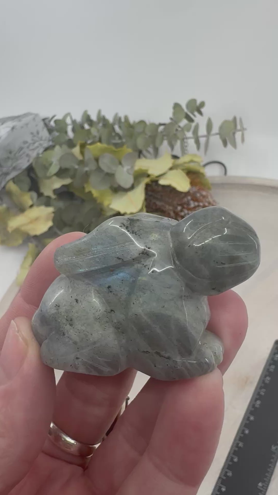 video of Labradorite Rabbit Carving 5 cm × 3.5 cm – iridescent blue-green crystal rabbit symbolising magic, transformation and protection, Inspired By 3 Australia.