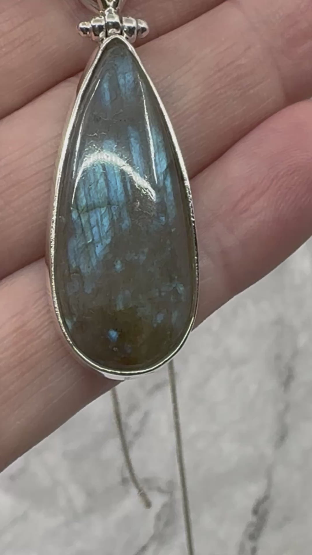 Labradorite Silver Pendant - “I welcome change and transformation into my life”.