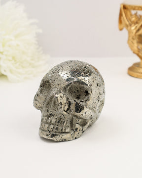Large polished Pyrite Skull Carving with sparkling natural crystal formations and metallic silver-gold finish weighing 1.079kg.