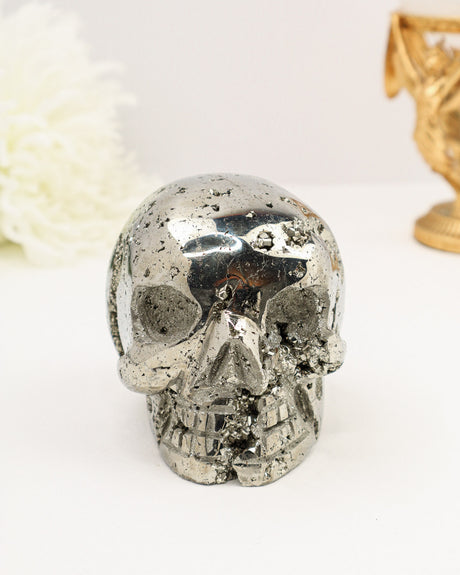 Large polished Pyrite Skull Carving with sparkling natural druzy crystal formations and metallic silver shine weighing 1.64kg.