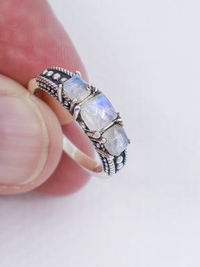  Natural Rainbow Moonstone sterling silver ring size 9 with three pearly white gemstones displaying blue flash in an ornate .925 silver setting.