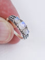  Natural Rainbow Moonstone sterling silver ring size 9 with three pearly white gemstones displaying blue flash in an ornate .925 silver setting.