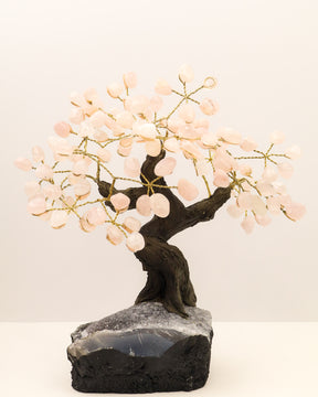 Handcrafted Rose Quartz Crystal Tree with 24 gemstone branches on a sparkling natural geode and Chalcedony style crystal base.