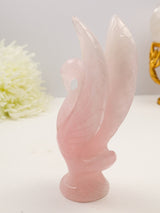 Large hand-carved Rose Quartz Swan 568g measuring 18cm with blush pink natural crystal, detailed raised wings and feather carving.