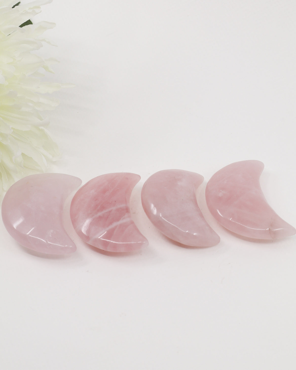 Natural Rose Quartz crescent moon crystal carving approximately 7cm with soft pink colouring