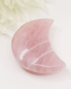 Natural Rose Quartz crescent moon crystal carving approximately 7cm with soft pink colouring