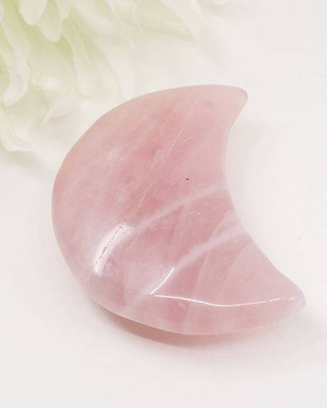 Natural Rose Quartz crescent moon crystal carving approximately 7cm with soft pink colouring