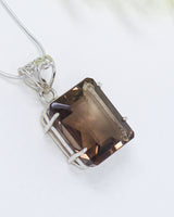 Brazilian Smoky Quartz sterling silver pendant with rectangular faceted brown crystal for grounding, protection and spiritual jewellery Australia.