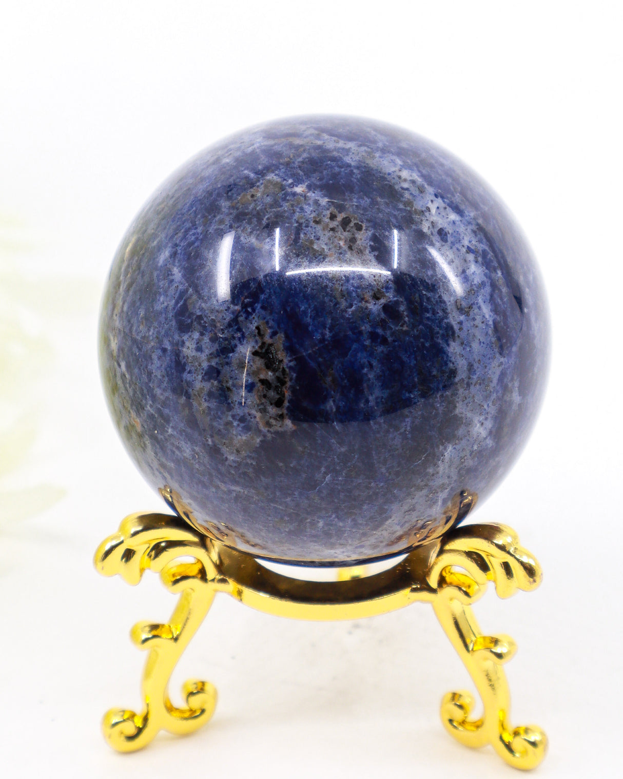 Natural Sodalite sphere 189g 5cm with deep navy blue, grey and white mineral patterning, polished crystal sphere with stand.