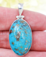 Natural Turquoise sterling silver pendant with vivid blue stone and natural mineral matrix, large oval .925 silver Turquoise crystal pendant.