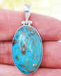 Natural Turquoise sterling silver pendant with vivid blue stone and natural mineral matrix, large oval .925 silver Turquoise crystal pendant.