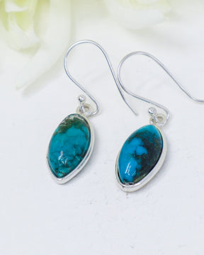 Natural Turquoise sterling silver drop earrings with blue marquise gemstones and earthy matrix in .925 silver settings.