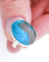 Turquoise sterling silver ring Size 7 with vivid blue oval stone and dramatic dark matrix, spiritual protection and truth crystal jewellery.