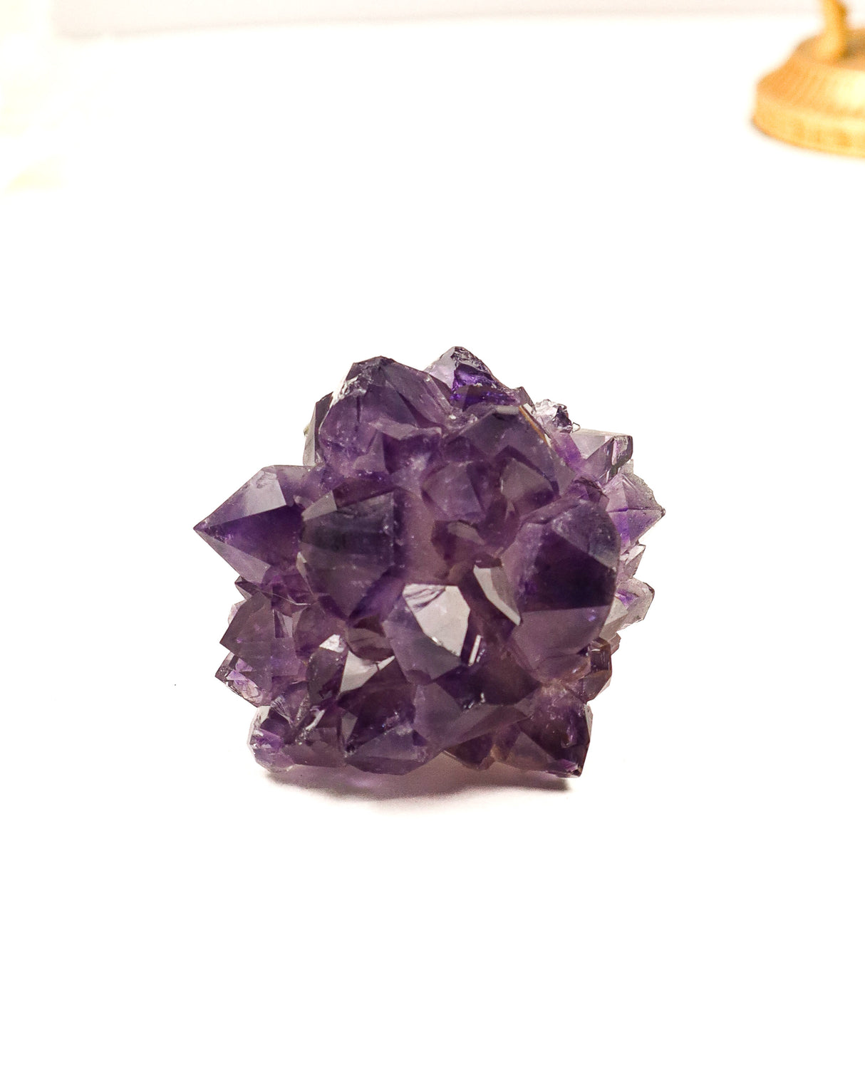81g Uruguay Amethyst Rose featuring deep purple crystal points surrounding a natural agate centre. Premium collector-quality crystal specimen from Uruguay.