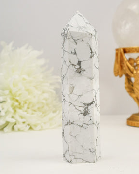 Shop this calming White Howlite Tower with beautiful natural veining. A peaceful crystal for stress relief, meditation and emotional balance.