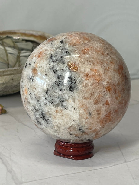 Sunstone Sphere 8.5cm - "I am filled with vibrations of love, light, and joy."