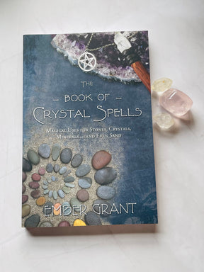 The Book of Crystal Spells by Ember Grant – crystal magic and spellwork book